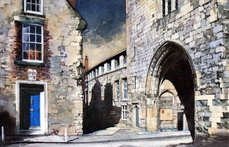 The ancient medieval arched entrance to the College an area behind the Cathedral which is the home of the clergy and the Chorister School. The staircase to the Cathedral Chapter Office can just be made out in the shadows of the passage in the centre of view which also leads to the Cathedral workshops. Part of the 2014 Durham Cathedral Exhibition.