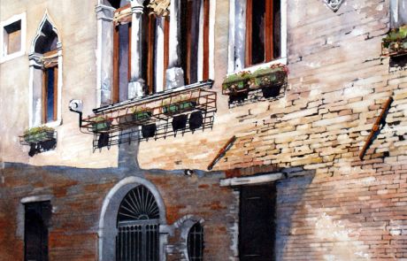 This distressed facade adds to the charm of one of the many palazzios to be found on the back waters of Venice.
