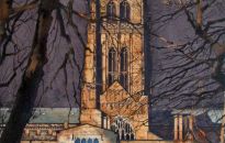 The magnificent central tower is 218 feet in height and here set against a darkened evening winter sky.