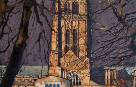 The magnificent central tower is 218 feet in height and here set against a darkened evening winter sky.